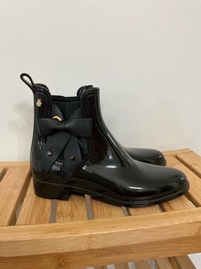 Patented Black Bow-Accent Chelsea Ankle Boots